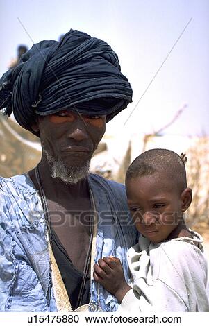 Stock Image - male, beard, white, headcloth, dark. Fotosearch