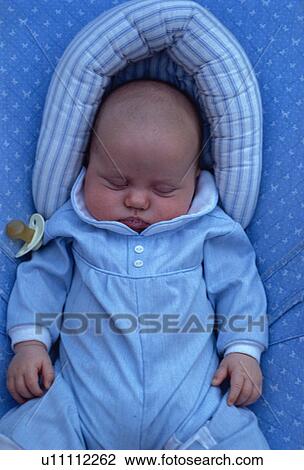 Stock Image - male, released, boy, baby, sleeping, model. Fotosearch