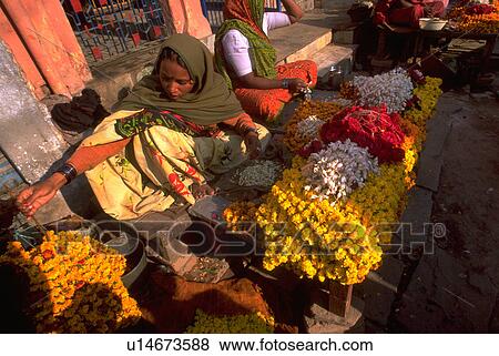 Stock Photo - market, sharing, sellers, costumers, flowers. Fotosearch