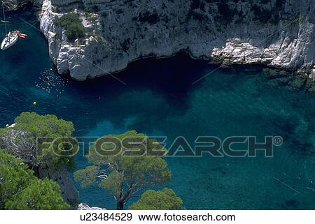 Stock Photo - mediterranean, summer, sailboat, view, clifftop, water. Fotosearch