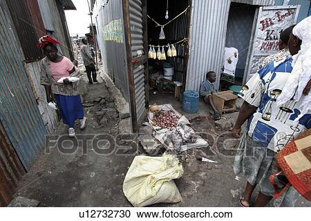 Stock Image - mukuru, person, shops, small, kenya, people. Fotosearch