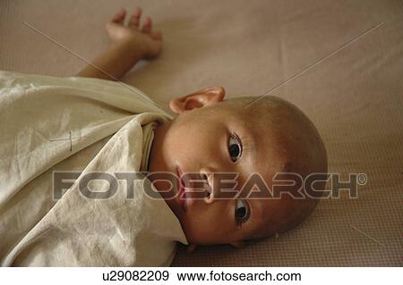 Stock Photo - orphanage, people, underdeveloped, cambodia, person, baby. Fotosearch
