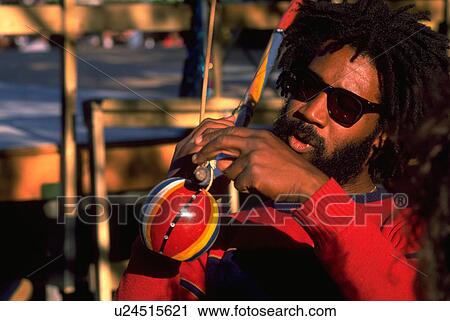 Stock Image - people, lake, festival, male, music. Fotosearch