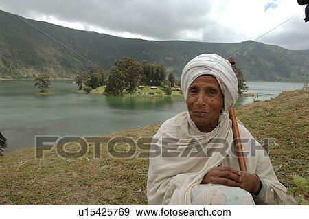 Stock Photo - person, robe, elderly, people. Fotosearch