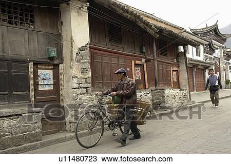 Stock Image - person, wheeling, male, china, people. Fotosearch