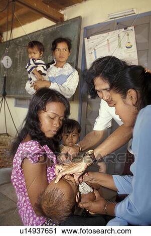 phnom, person, infant, vaccination, cambodia, people View Large Photo Image Stock Image - phnom, person, infant, vaccination, cambodia, people. Fotosearch