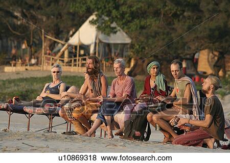 Stock Photo - playing, people, tourists, india, person, beach. Fotosearch