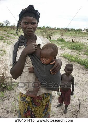 Stock Photography - poor, people, zambia, children, person, woman. Fotosearch