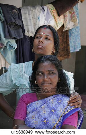Stock Photo - posttsunami, office, visits, india, person, people. Fotosearch