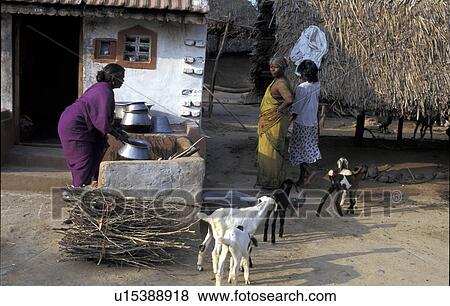 Stock Photo - pot, people, preparing, india, person, woman. Fotosearch