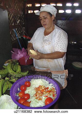Stock Image - preparing, food, nicaragua, person, people, woman. Fotosearch