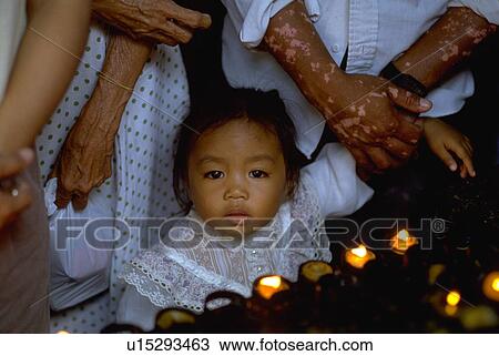 santo, girl, candles, amidst, filipino, family View Large Photo Image Stock Image - santo, girl, candles, amidst, filipino, family. Fotosearch