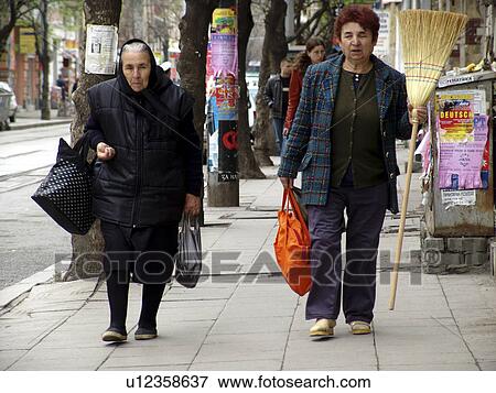 Stock Photo - scene, person, street, bulgaria, women, people. Fotosearch