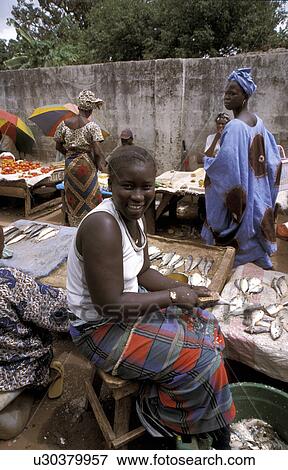 Stock Photo - sellers, person, gambia, 7483, fish, people. Fotosearch