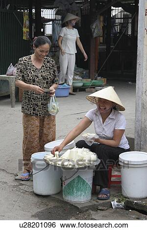 Stock Photograph - selling, people, female, vietnam, person, woman. Fotosearch