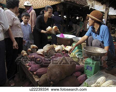 Picture - selling, people, stall, cambodia, person, flowers. Fotosearch