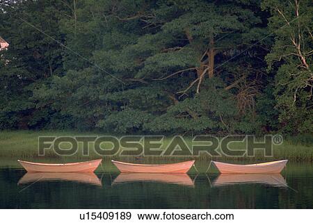 Stock Photo - shore, pattern, boats, pink, three, water. Fotosearch