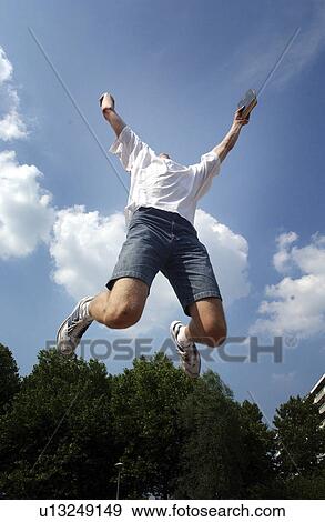 Stock Photo - sky, jumping, god, faith, bible, happy. Fotosearch