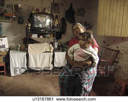 Stock Image - slum, house, honduras, home, person, people. Fotosearch