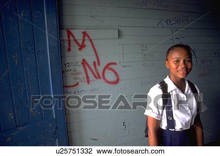 Stock Image - smile, jamaican, uniform, student, schoolgirl, girl. Fotosearch