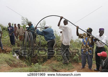 Stock Photo - tanzania, fashion, person, people, frame, water. Fotosearch