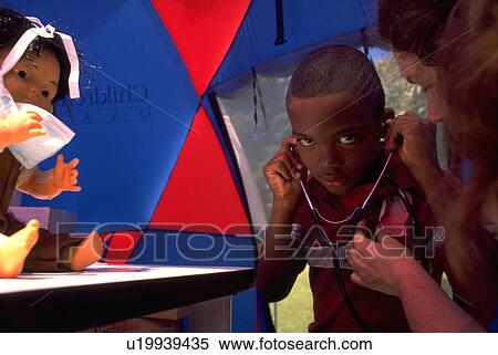 Stock Photography - trying, woman, boy, children, people, medical. Fotosearch