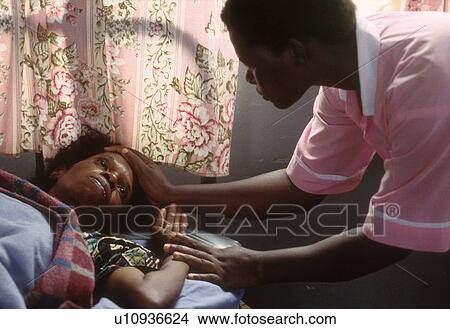 Picture - villa, nurse, aids, uganda, patient, 3845. Fotosearch