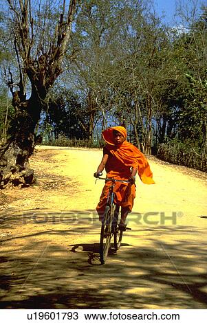 xishuangbana, buddhist, bicycle, riding, monk, young View Large Photo Image Stock Image - xishuangbana, buddhist, bicycle, riding, monk, young. Fotosearch