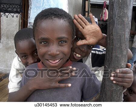 Stock Image - zambia, person, hamming, boys, children, people. Fotosearch