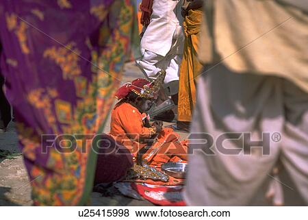Stock Photo - 2001, kid, facepaint, headdress, hindu, child. Fotosearch
