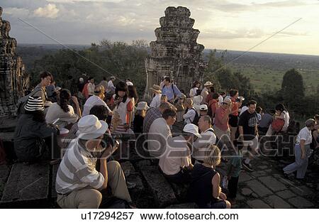 Stock Photo - angkor, person, temple, tourists, cambodia, people. Fotosearch