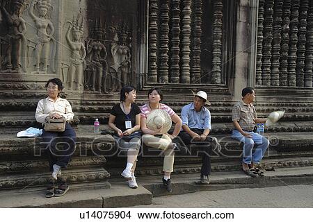 Picture - angkor, person, visiting, tourists, cambodia, people. Fotosearch