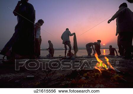 Stock Photograph - around, fire, worshipers, peasant, hindu, water. Fotosearch