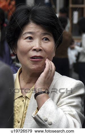 Stock Photo - asakusa, people, faces, japan, person, woman. Fotosearch