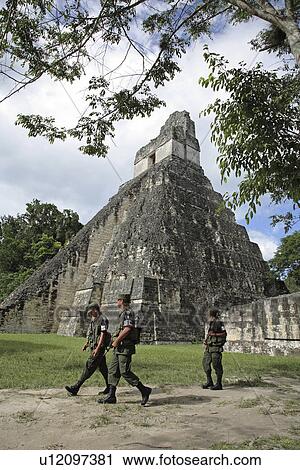 Stock Image - attikal, person, ruins, mayan, guatemala, people. Fotosearch