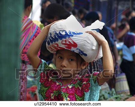 Stock Image - bag, girl, carrying, guatemala, person, people. Fotosearch