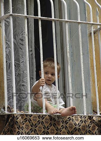 Stock Image - bars, child, window, turkey, person, people. Fotosearch