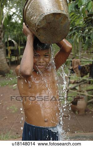 Picture - bath, person, taking, boy, cambodia, people. Fotosearch