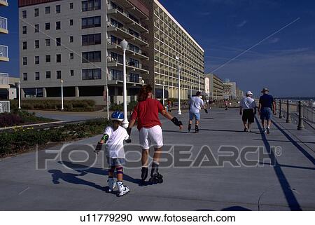 Stock Image - beach, daughter, virginia, boardwalk, rollerblade, mother. Fotosearch