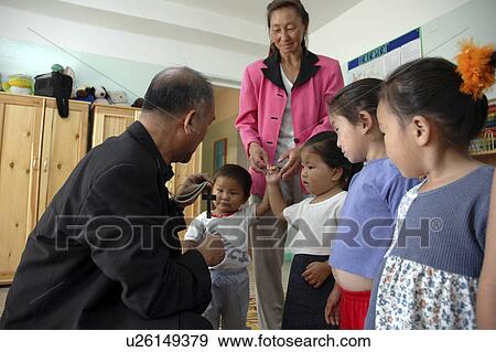 Stock Photo - bishop, person, catholic, mongolia, children, people. Fotosearch