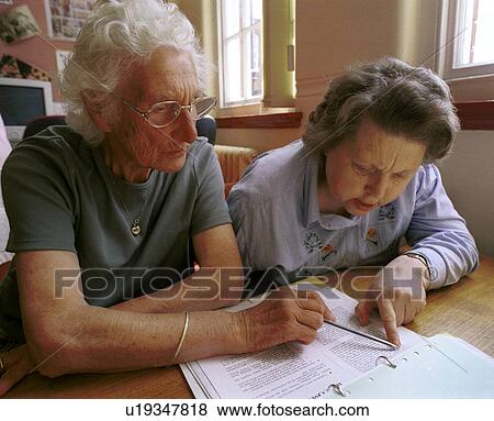 Stock Photo - book, woman, person, child, people, background. Fotosearch