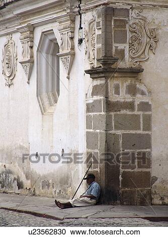 Stock Image - building, beggar, colonial, corner, sitting, guatemala. Fotosearch