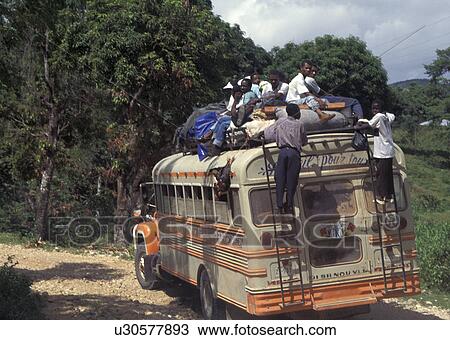 Stock Image - bus, person, overcrowded, haiti, 3715, people. Fotosearch
