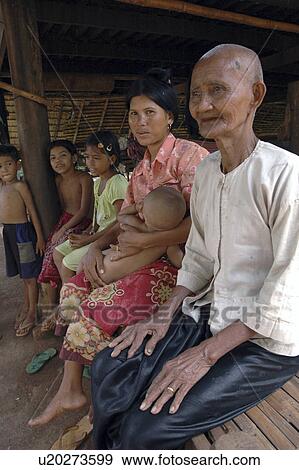 Stock Photo - cambodia, people, children, person, house, family. Fotosearch