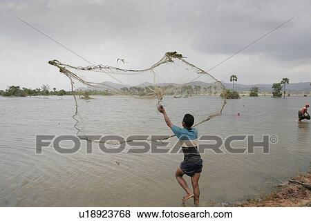 Stock Photo - cambodia, water, person, people, food, business. Fotosearch