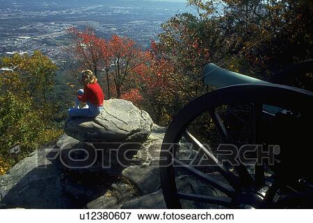 Stock Photo - canyon, woman, overlooking, tourist, female, young. Fotosearch