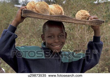 carrying, child, boy, tanzania, person, people View Large Photo Image Stock Photography - carrying, child, boy, tanzania, person, people. Fotosearch