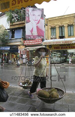 Stock Photograph - carrying, people, female, vietnam, person, woman. Fotosearch