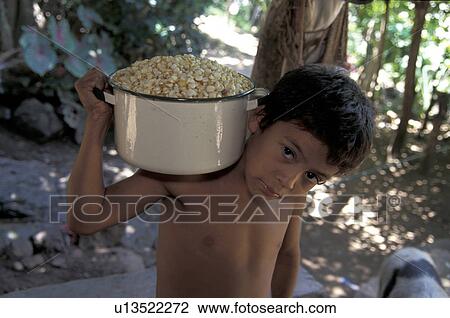 Stock Image - carrying, person, boy, salvador, 5086, people. Fotosearch