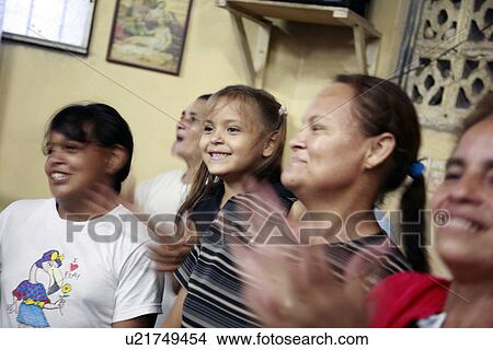 Picture - catholic, girl, congregation, honduras, person, people. Fotosearch